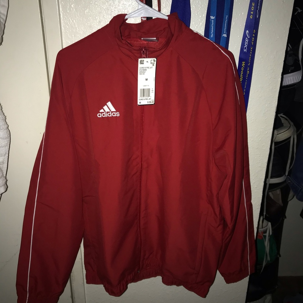 Addida’s Jacket Power Red.